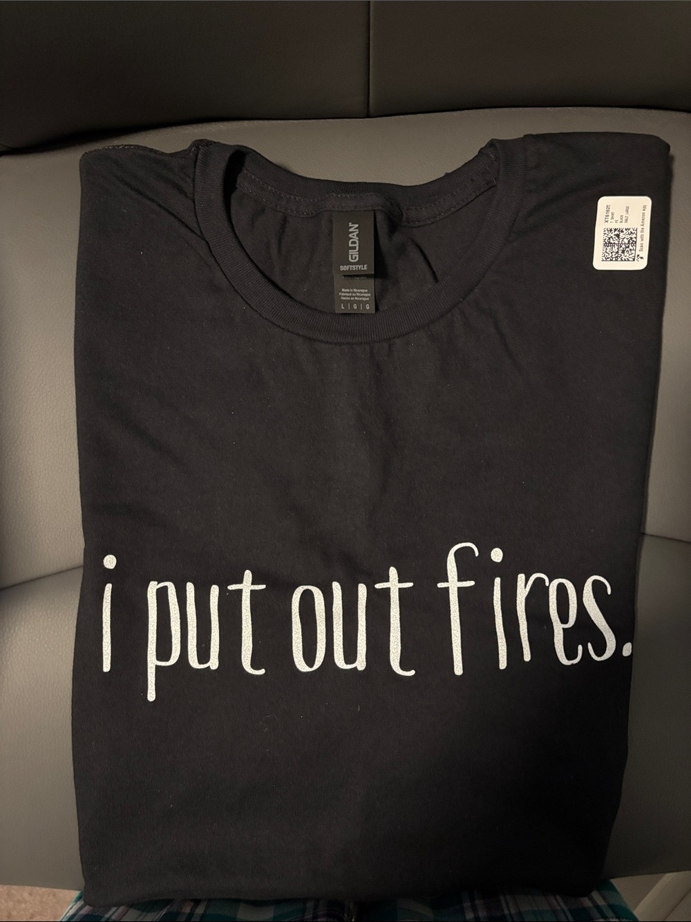 Gildan Black T‑Shirt with White 'i put out fires.' Text